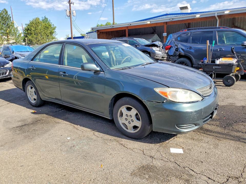 2002 Toyota Camry VIN 4T1BE32K82U504555 COPART salvage auction — FRONT END, Co - Dis/Dlr/Exp Only Clean Title, sold $275 on 2026-07-02 (photo 4)