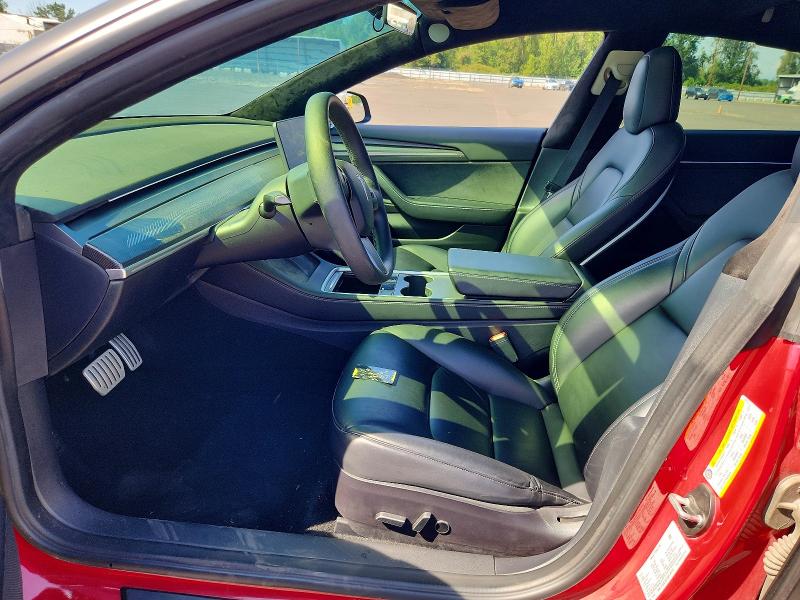 2022 Tesla Model 3 VIN 5YJ3E1EC7NF129773 COPART salvage auction — SIDE, Or - Salvage Title Certificate, sold $1,050 on 2026-07-29 (photo 7)