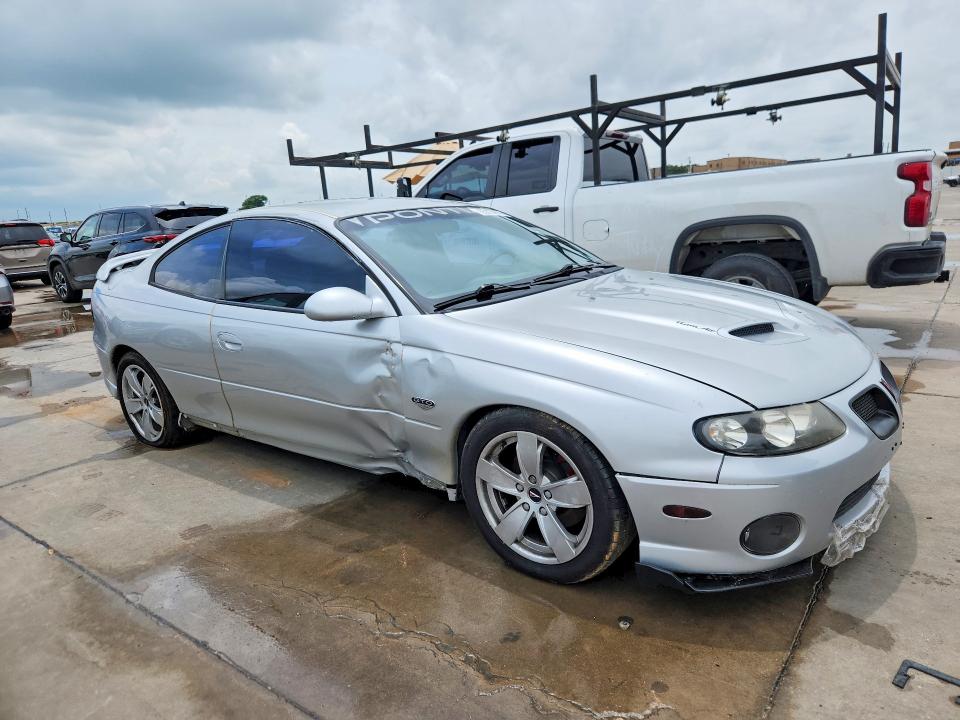 2005 Pontiac Gto VIN 6G2VX12U25L406771 COPART salvage auction — SIDE, TX - SALVAGE VEHICLE TITLE (P), sold $6,900 on 2026-07-16 (photo 4)