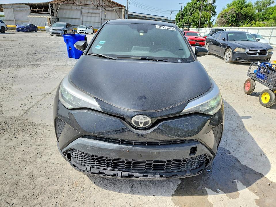 2021 Toyota C-hr VIN JTNKHMBX5M1118270 COPART salvage auction — MINOR DENT/SCRATCHES, TX - CERTIFICATE OF TITLE, sold $6,200 on 2026-07-07 (photo 5)