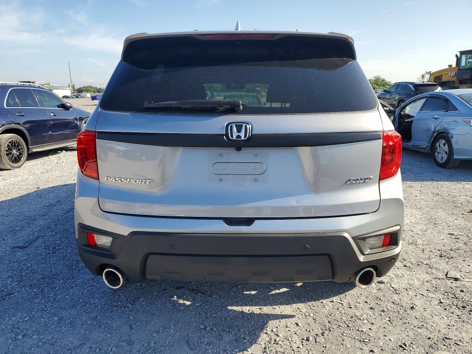 2023 Honda Passport VIN 5FNYF8H59PB028942 COPART salvage auction — WATER/FLOOD, FL - CERT OF TITLE-SLVG REBLD FLOOD, sold $12,100 on 2026-07-28 (photo 6)