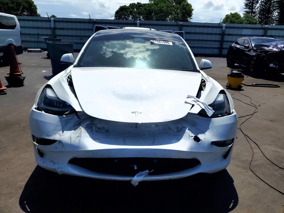 2023 Tesla Model 3 VIN 5YJ3E1EA3PF670241 COPART salvage auction — FRONT END, FL - CERTIFICATE OF DESTRUCTION, sold $8,600 on 2026-07-27 (photo 5)