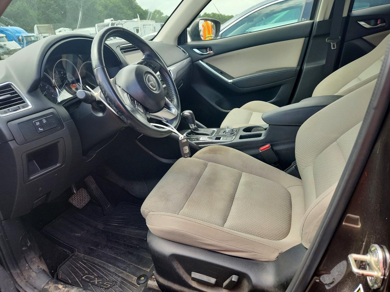 2016 Mazda CX-5 VIN JM3KE2CYXG0886479 COPART salvage auction — Water/Flood, LA - CERT OF TITLE-SALVAGE FLOOD, sold $2,100 on 2026-07-09 (photo 7)