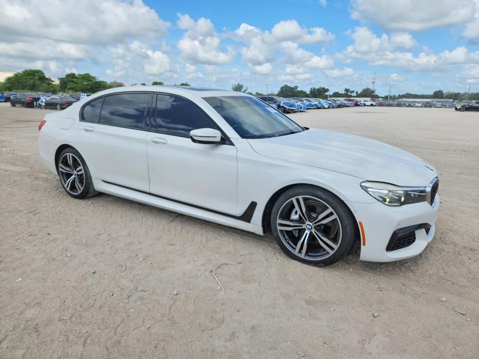 2016 BMW 7er VIN WBA7E2C58GG547860 COPART salvage auction — MINOR DENT/SCRATCHES, Fl - Certificate Of Title (P), sold $9,500 on 2026-07-10 (photo 4)