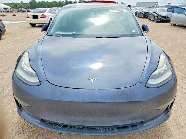 2018 Tesla VIN 5YJ3E1EA3JF033938 COPART salvage auction — HAIL, Tx - Certificate Of Title, sold $150 on 2026-07-21 (photo 5)