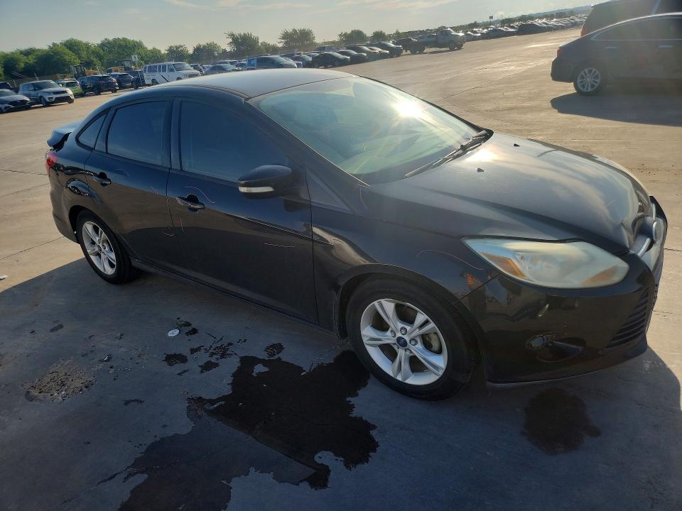 2014 Ford Focus VIN 1FADP3F29EL460518 COPART salvage auction — REAR END, Tx - Salvage Vehicle Title, sold $750 on 2026-07-02 (photo 4)