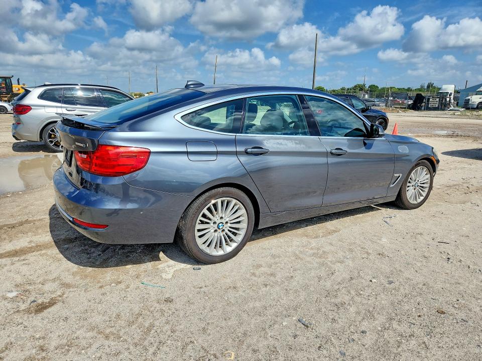 2015 BMW 3er VIN WBA3X5C55FD562777 COPART salvage auction — MINOR DENT/SCRATCHES, FL - CERTIFICATE OF TITLE, sold $2,500 on 2026-07-28 (photo 3)