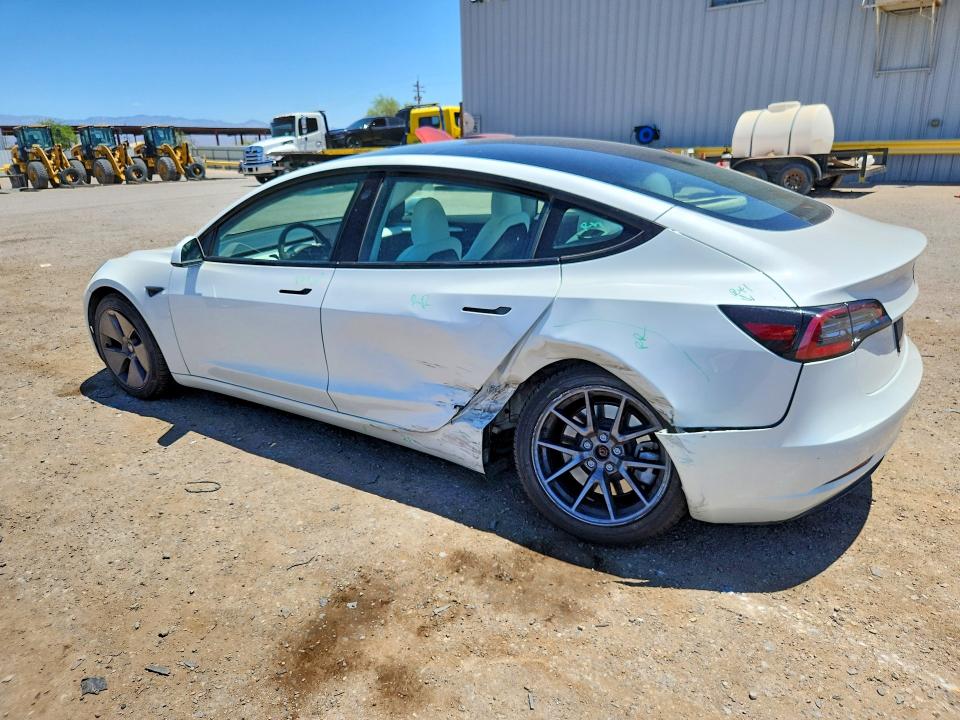 2023 Tesla Model 3 VIN 5YJ3E1EA6PF552040 COPART salvage auction — SIDE, Salvage Title, sold $9,600 on 2026-08-28 (photo 2)
