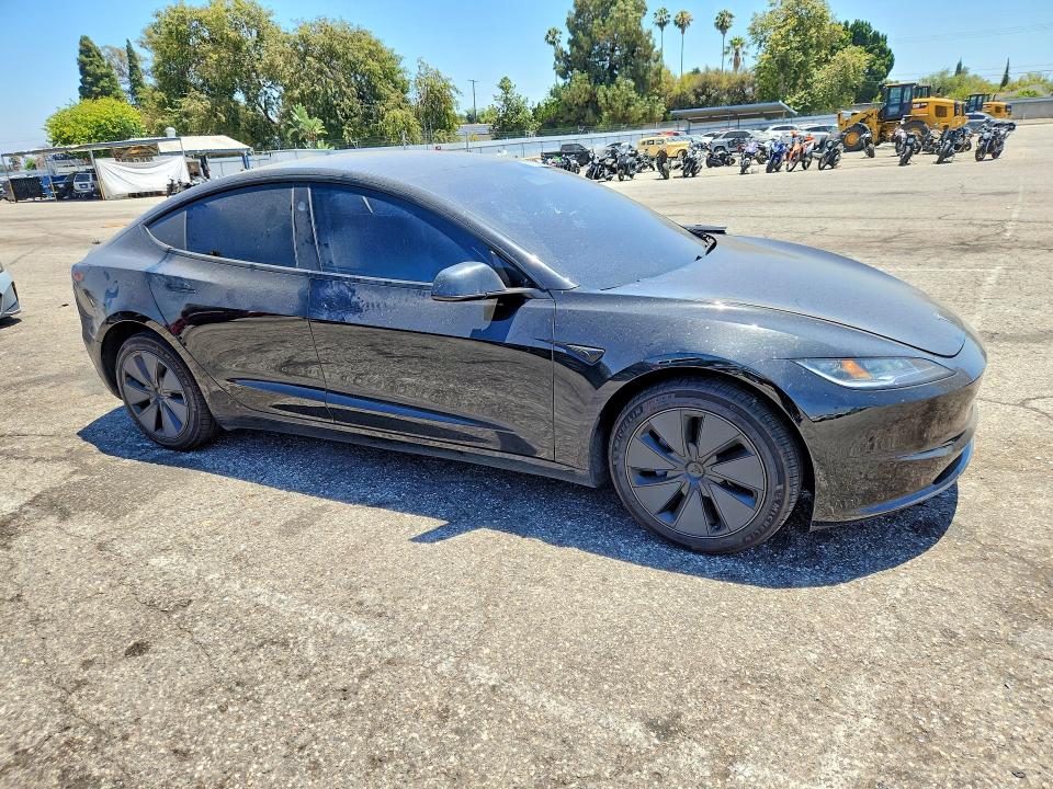 2025 Tesla VIN 5YJ3E1EA1SF011065 COPART salvage auction — SIDE, CA - SALVAGE CERTIFICATE, sold $10,700 on 2026-07-28 (photo 4)