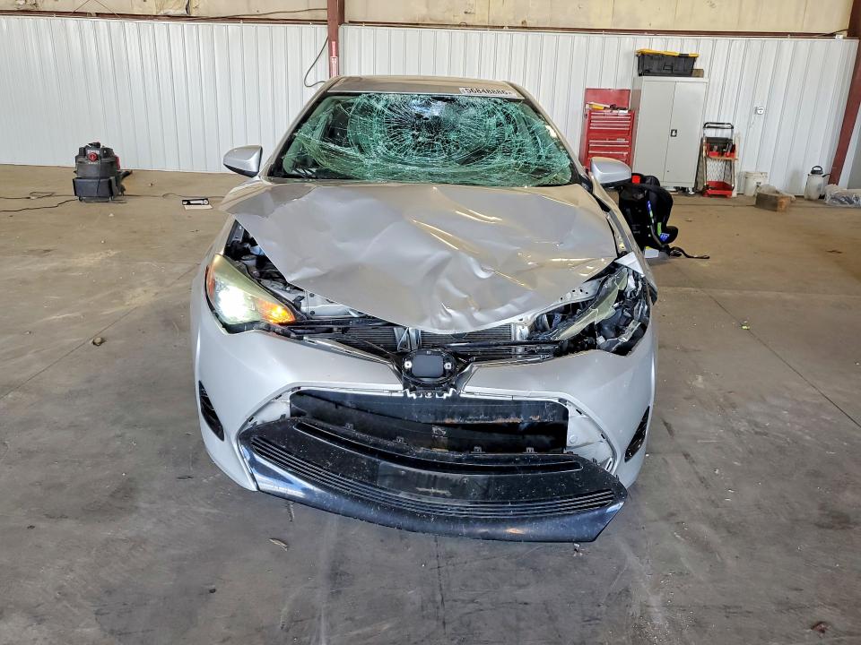 2017 Toyota Corolla VIN 5YFBURHE7HP699047 COPART salvage auction — WATER/FLOOD, IA - CERT OF TITLE-SALVAGE TITLE, sold $2,250 on 2026-07-22 (photo 5)