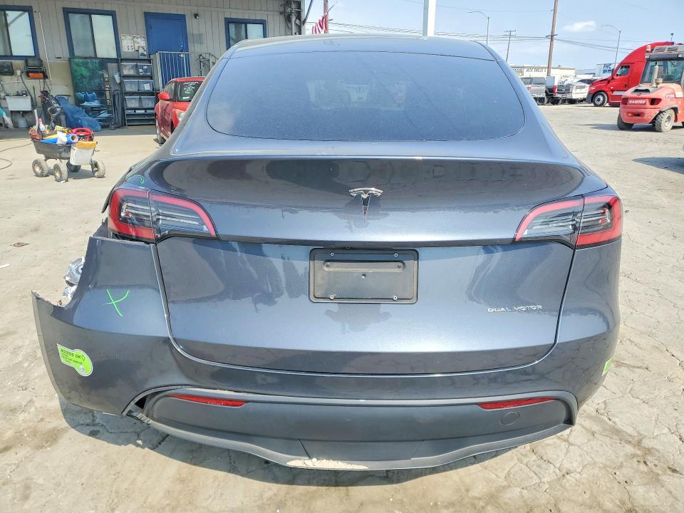 2023 Tesla Model y VIN 7SAYGDEE4PA047845 COPART salvage auction — REAR END, CA - SALVAGE CERTIFICATE, sold $8,400 on 2026-07-30 (photo 6)