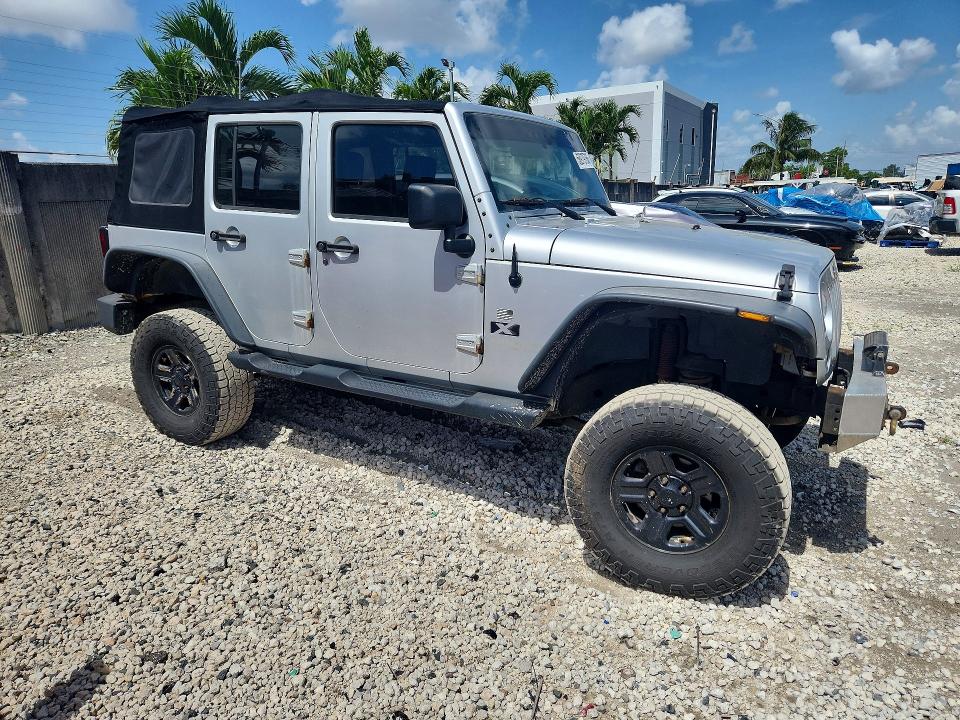 2007 Jeep Wrangler / VIN 1J4GA39197L140348 COPART salvage auction — MINOR DENT/SCRATCHES, Me - Certificate Of Title, sold $2,100 on 2026-07-02 (photo 4)