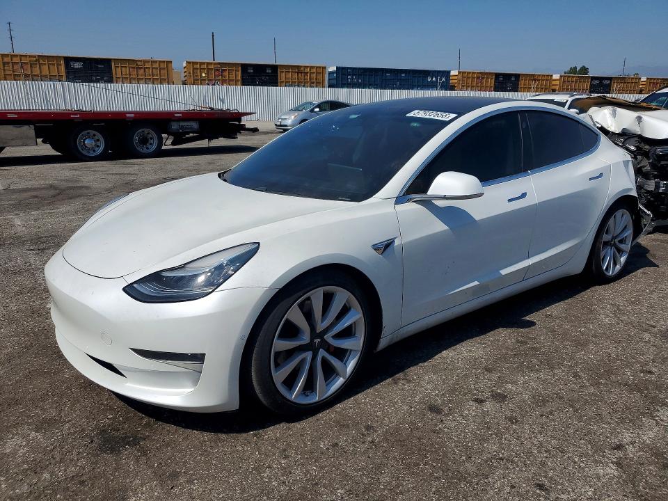 2020 Tesla Model 3 VIN 5YJ3E1EB0LF667669 — COPART salvage auction photo