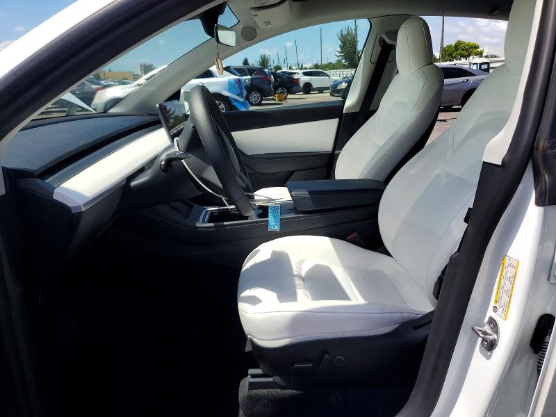 2022 Tesla Model y VIN 7SAYGAEE8NF390270 COPART salvage auction — REAR END, Fl - Cert Of Title Slvg Rebuildable, sold $9,900 on 2026-08-03 (photo 7)