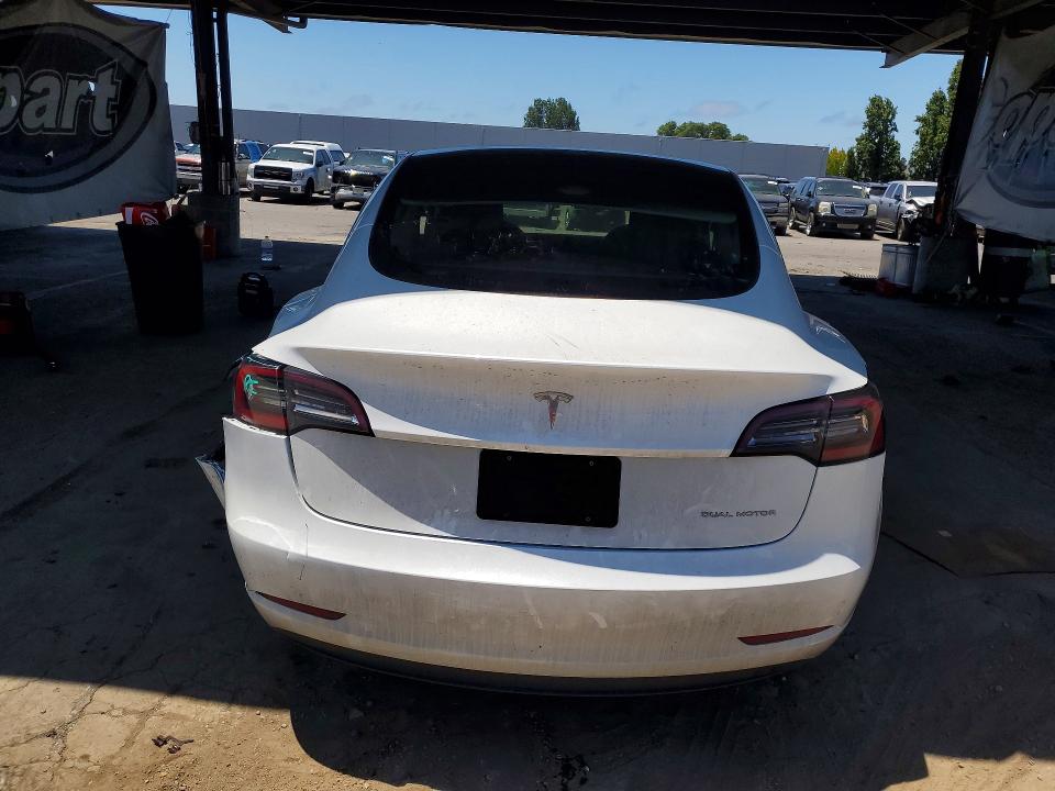2023 Tesla VIN 5YJ3E1EB8PF388444 COPART salvage auction — REAR END, CA - SALVAGE CERTIFICATE, sold $8,500 on 2026-07-02 (photo 6)