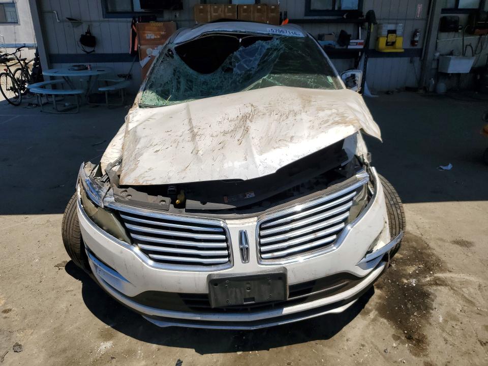 2015 Lincoln Mkz VIN 5LMCJ1A90FUJ15866 COPART salvage auction — ROLLOVER, Ca - Salvage Certificate, sold $425 on 2026-07-02 (photo 5)