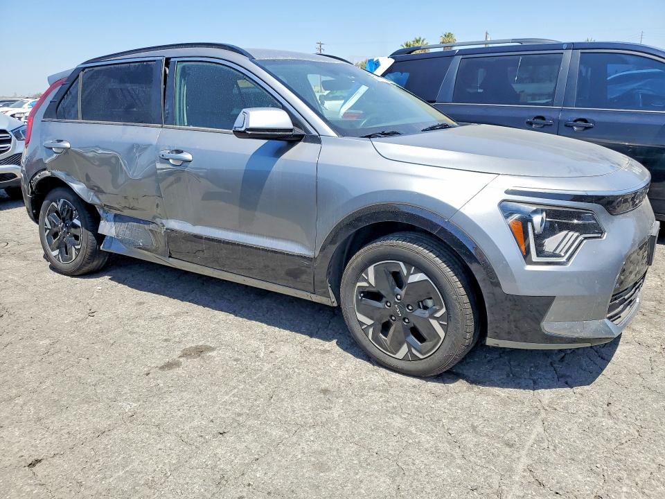 2023 Kia Niro VIN KNDCR3L11P5028654 COPART salvage auction — SIDE, CA - SALVAGE CERTIFICATE, sold $8,200 on 2026-07-16 (photo 4)
