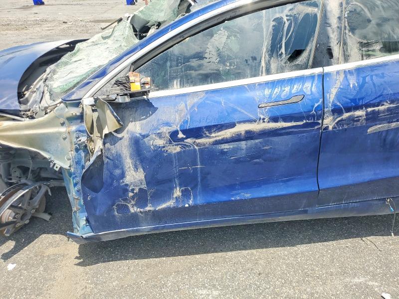 2019 Tesla Model 3 VIN 5YJ3E1EA2KF431739 COPART salvage auction — ALL OVER, FL - CERT OF TITLE-REBUILDABLE SLVG, sold $275 on 2026-07-02 (photo 7)