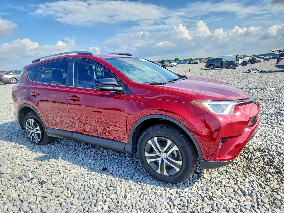 2018 Toyota Rav 4 VIN 2T3ZFREV7JW491985 COPART salvage auction — SIDE, Fl - Cert Of Title Slvg Rebuildable, sold $8,200 on 2026-07-02 (photo 4)
