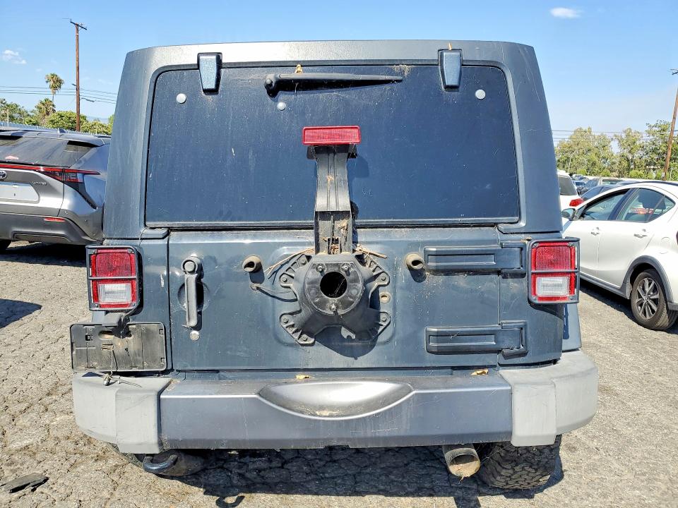 2017 Jeep Wrangler / VIN 1C4BJWDG2HL669557 COPART salvage auction — FRONT END, Ca - Dis/Dlr/Exp Only Clean Title, sold $2,700 on 2026-08-10 (photo 6)