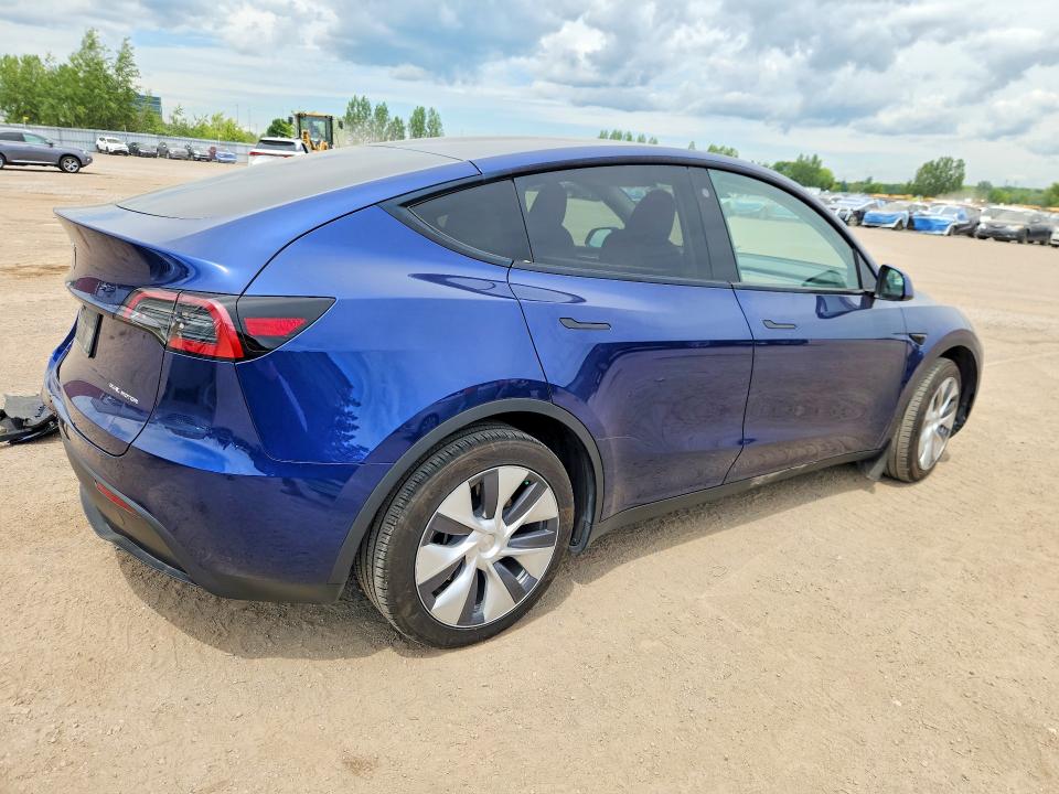 2023 Tesla Model y VIN LRWYGDEE0PC228256 COPART salvage auction — REAR END, ON - PERMIT SALVAGE, sold $10,700 on 2026-07-30 (photo 3)