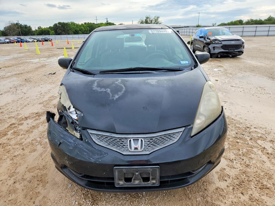 2011 Honda Fit VIN JHMGE8H34BC027411 COPART salvage auction — SIDE, Tx - Salvage Vehicle Title, sold $900 on 2026-07-30 (photo 5)