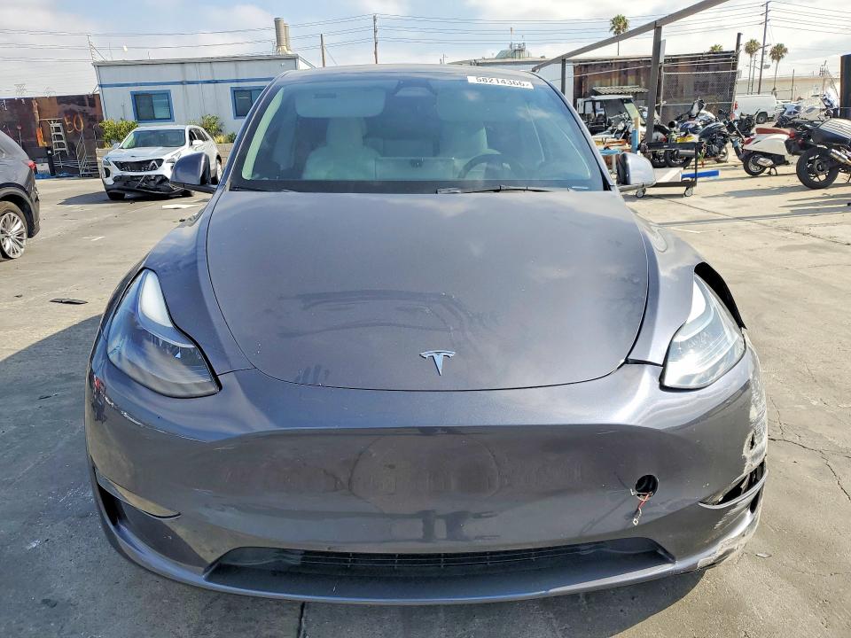 2023 Tesla Model y VIN 7SAYGDEE0PF925676 COPART salvage auction — FRONT END, Ca - Salvage Certificate, sold $9,400 on 2026-07-02 (photo 5)