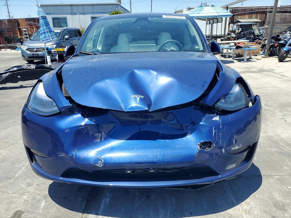 2024 Tesla Model y VIN 7SAYGDED8RF153681 COPART salvage auction — FRONT END, Salvage Title, sold $14,300 on 2026-07-22 (photo 5)
