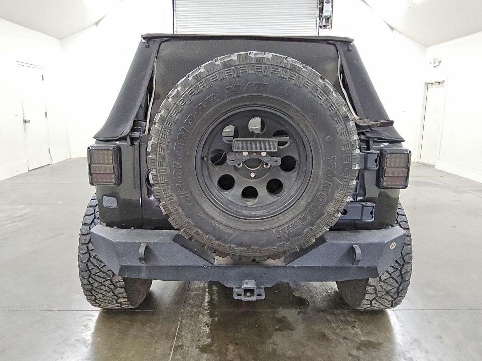 2016 Jeep Wrangler unlimited VIN 1C4BJWDG8GL228594 COPART salvage auction — MINOR DENT/SCRATCHES, Tx - Certificate Of Title, sold $3,550 on 2026-07-02 (photo 6)