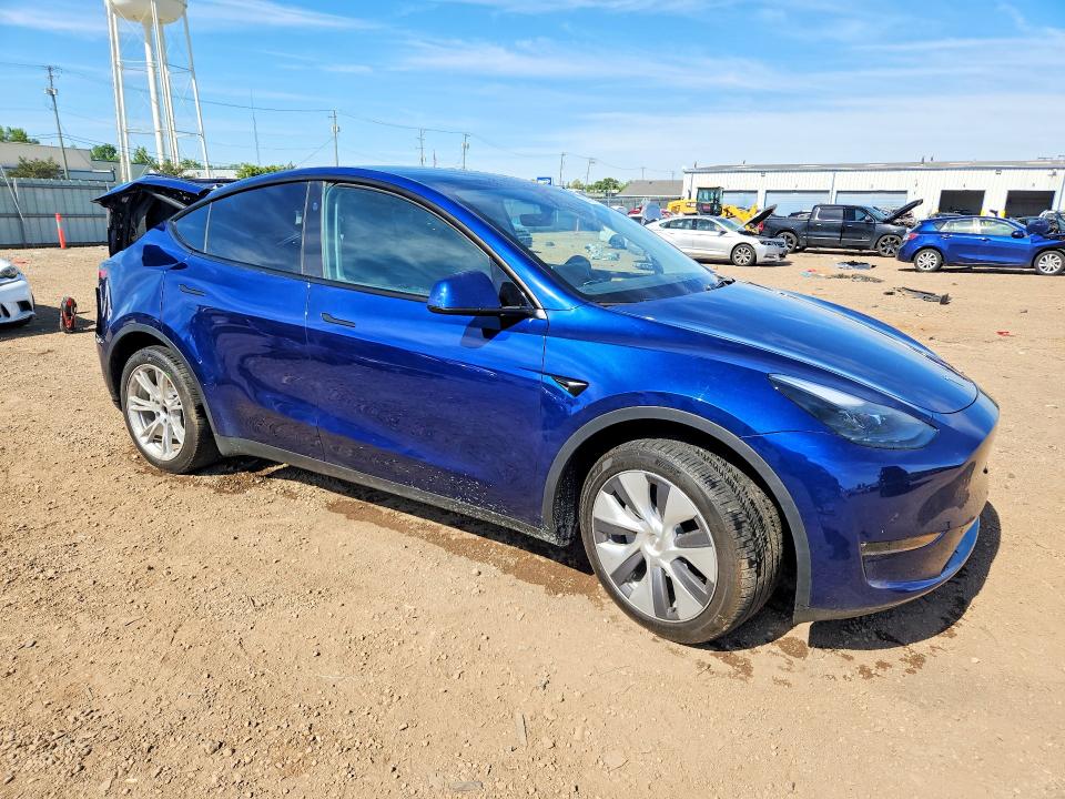 2023 Tesla Model y VIN 7SAYGDEE0PA205372 COPART salvage auction — REAR END, Il - Salvage Certificate, sold $9,900 on 2026-07-29 (photo 4)