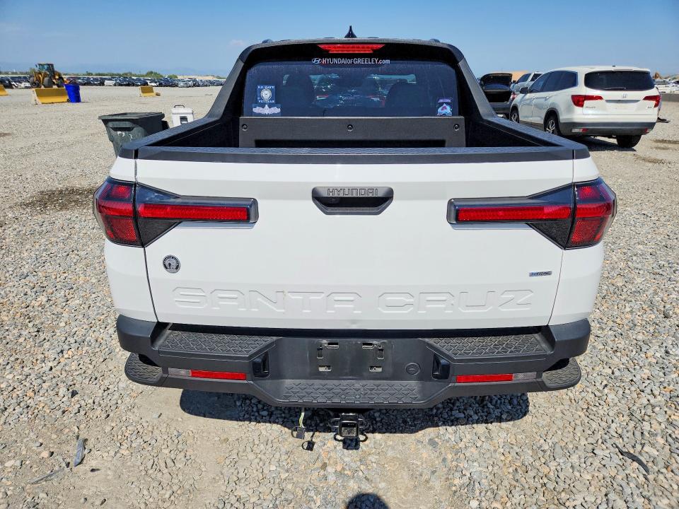 2025 Hyundai Santa cruz VIN 5NTJBDDE6SH135647 COPART salvage auction — HAIL, Co - Certificate Of Title, sold $13,700 on 2026-07-23 (photo 6)
