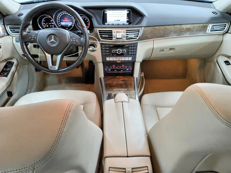 2014 Mercedes-benz E-class VIN WDDHH8JB8EB025501 COPART salvage auction — NORMAL WEAR, Wv - Certificate Of Title, sold $2,900 on 2026-07-09 (photo 8)