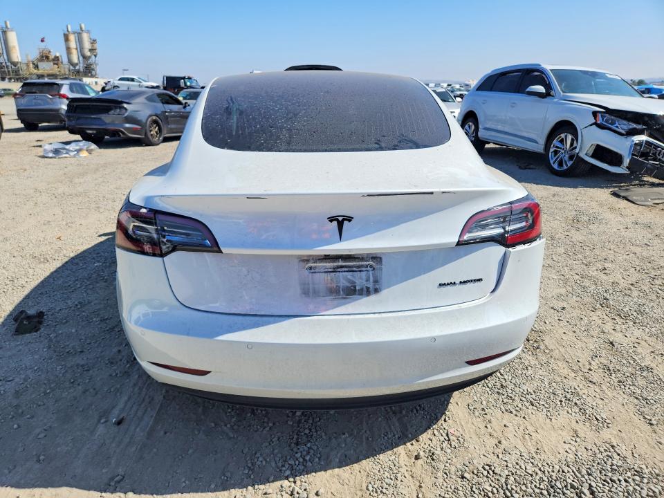 2019 Tesla Model 3 VIN 5YJ3E1EB5KF513134 COPART salvage auction — SIDE, Ca - Salvage Certificate, sold $7,500 on 2026-07-02 (photo 6)
