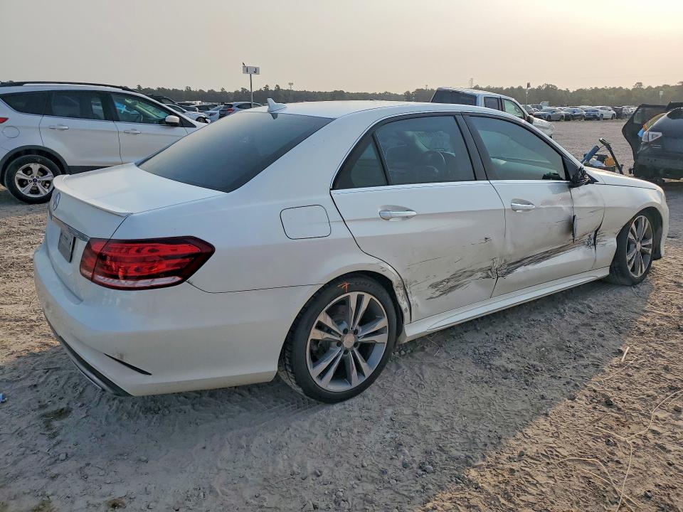 2014 Mercedes-benz E-klasse VIN WDDHF5KB0EA980804 COPART salvage auction — SIDE, TX - SALVAGE VEHICLE TITLE (P), sold $3,150 on 2026-07-17 (photo 3)