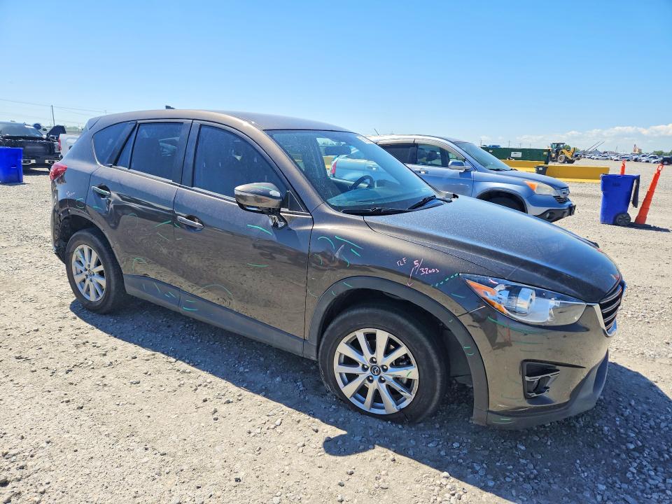 2016 Mazda Cx-5 VIN JM3KE4CY6G0855452 COPART salvage auction — SIDE, Co - Public - Salvage Title, sold $4,700 on 2026-07-07 (photo 4)