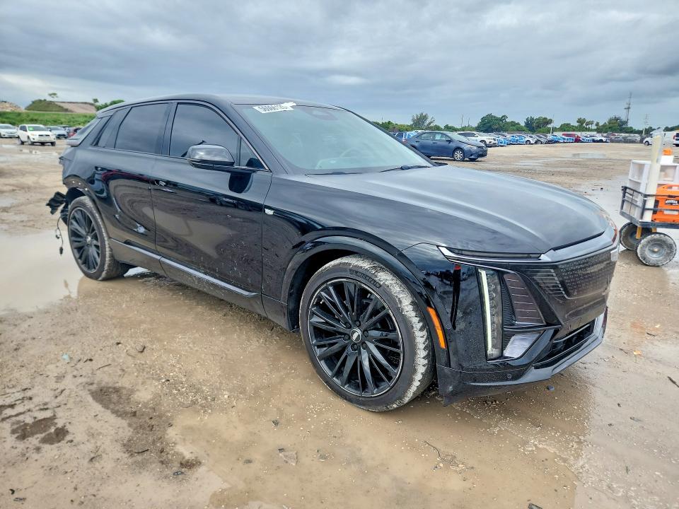 2024 Cadillac Lyriq VIN 1GYKPTRL2RZ137530 COPART salvage auction — REAR END, Fl - Cert Of Title Slvg Rebuildable, sold $14,600 on 2026-08-06 (photo 4)