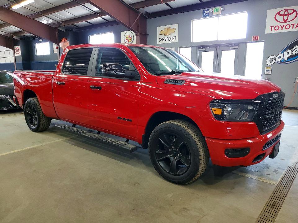 2023 Ram 1500 VIN 1C6SRFMT6PN697815 COPART salvage auction — MINOR DENT/SCRATCHES, Ny - Cert Of Title-Rebuilt Salvage, sold $9,700 on 2026-07-10 (photo 4)