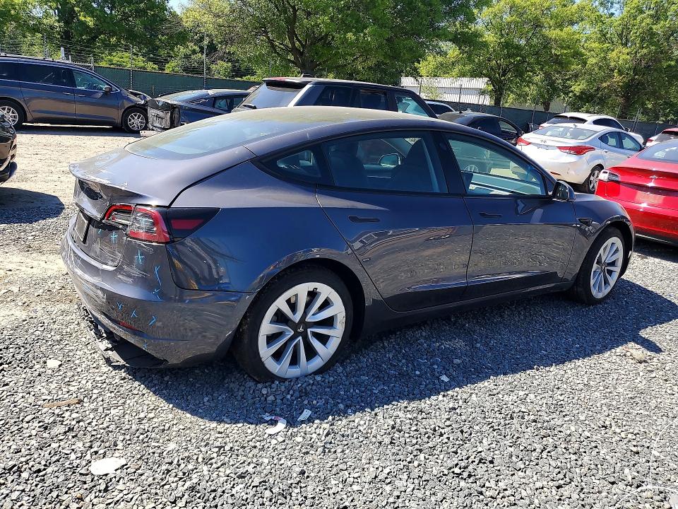 2023 Tesla Model 3 VIN 5YJ3E1EA6PF610258 COPART salvage auction — REAR END, Salvage Title, sold $5,400 on 2026-07-09 (photo 3)