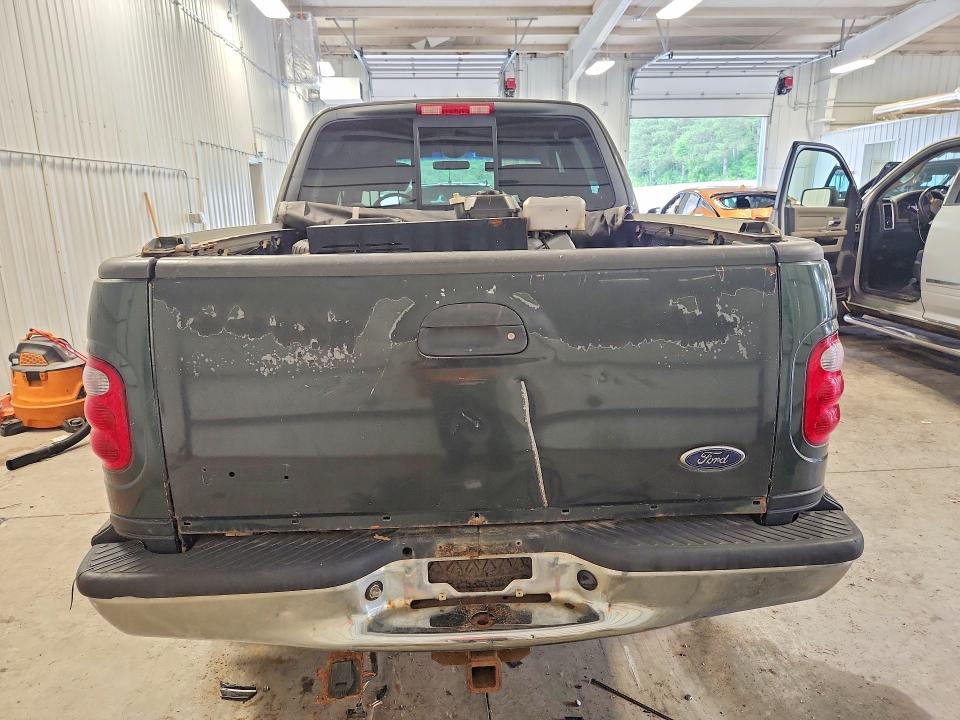 2003 Ford F-150 lightning VIN 1FTRW08LX3KB64336 COPART salvage auction — MECHANICAL, Mn - Cert Of Title-Prior Salvage, sold $800 on 2026-07-09 (photo 6)