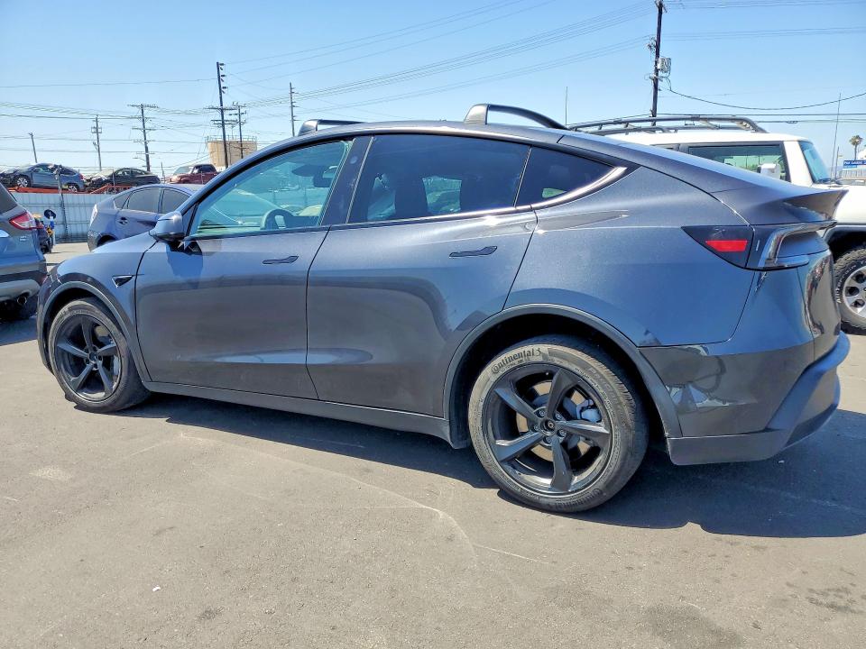 2026 Tesla Model y VIN 7SAYGDEE3TF345199 COPART salvage auction — SIDE, CA - SALVAGE CERTIFICATE, sold $15,800 on 2026-07-27 (photo 2)