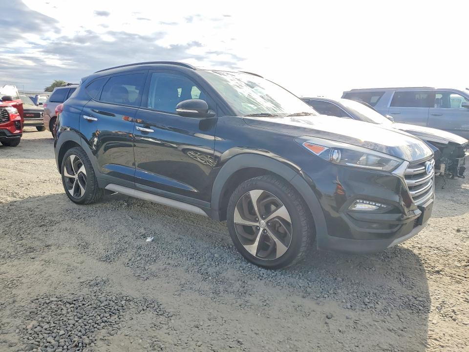 2017 Hyundai Tucson VIN KM8J3CA20HU598586 COPART salvage auction — MECHANICAL, Fl - Dis/Dlr/Exp Only Clean Title, sold $3,100 on 2026-07-28 (photo 4)