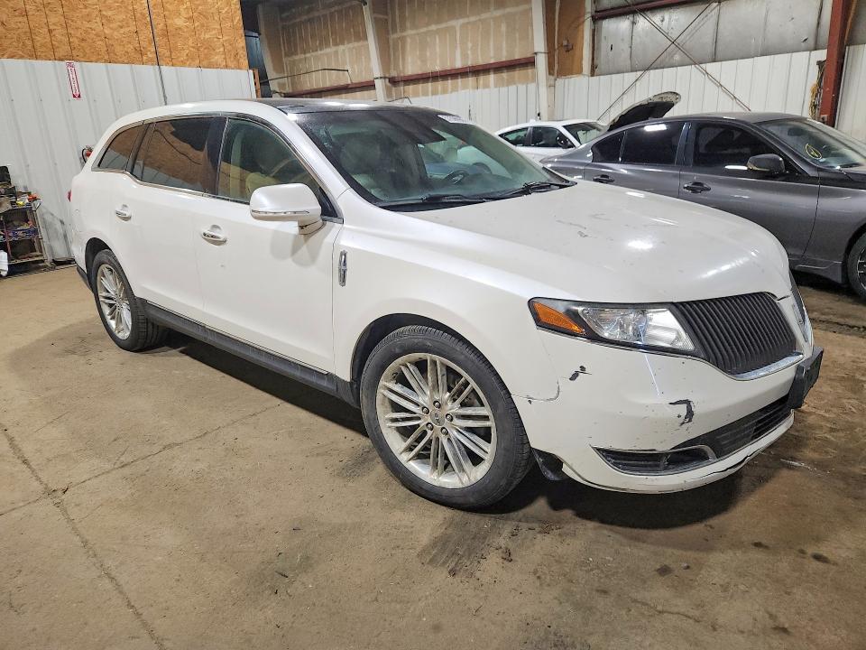 2013 Lincoln Mkt VIN 2LMHJ5AT2DBL57058 COPART salvage auction — MECHANICAL, Ak - Certificate Of Vehicle Title, sold $25 on 2026-07-21 (photo 4)
