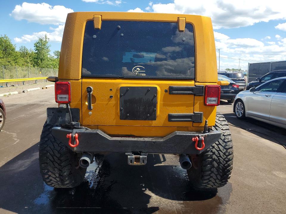 2014 Jeep Wrangler unlimited VIN 1C4BJWDG1EL276774 COPART salvage auction — MINOR DENT/SCRATCHES, Mi - Cert Of Title-Rebuilt Salvage, sold $6,800 on 2026-07-02 (photo 6)