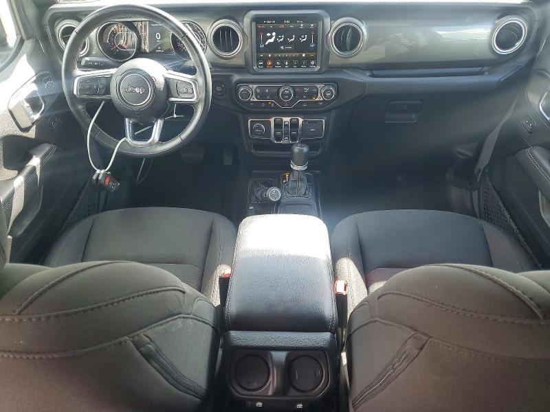 2023 Jeep Wrangler / VIN 1C4HJXEN0PW677098 COPART salvage auction — MINOR DENT/SCRATCHES, Mo - Certificate Of Title, sold $22,500 on 2026-07-02 (photo 8)