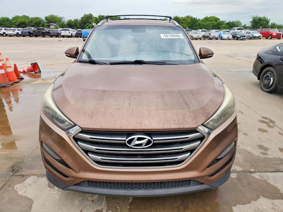 2016 Hyundai Tucson VIN KM8J33A29GU175164 COPART salvage auction — NORMAL WEAR, Fl - Certificate Of Title, sold $2,000 on 2026-07-27 (photo 5)