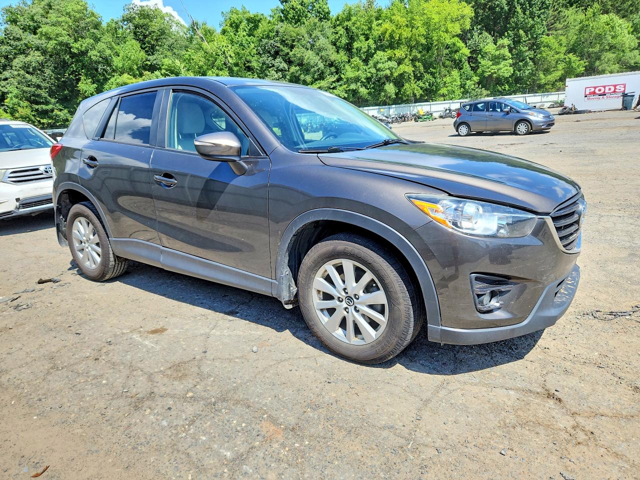 2016 Mazda CX-5 VIN JM3KE2CYXG0886479 COPART salvage auction — Water/Flood, LA - CERT OF TITLE-SALVAGE FLOOD, sold $2,100 on 2026-07-09 (photo 4)