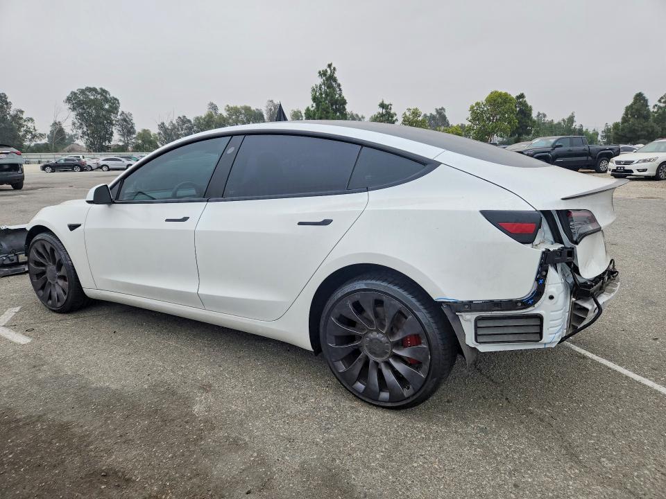2021 Tesla Model 3 VIN 5YJ3E1EC9MF077884 COPART salvage auction — REAR END, CA - SALVAGE CERTIFICATE, sold $500 on 2026-07-21 (photo 2)