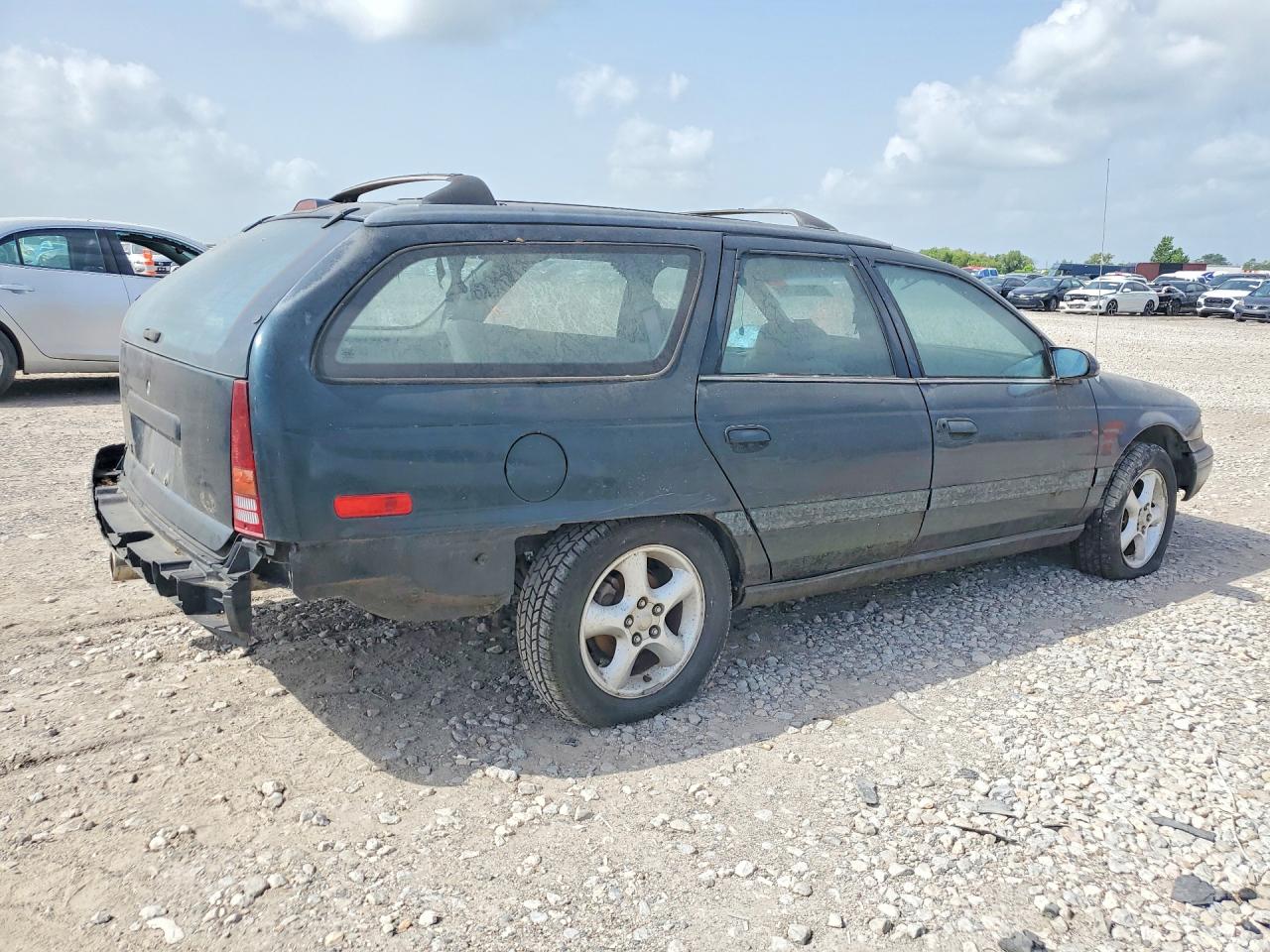 1994 Ford Taurus VIN 1FALP57UXRA217745 COPART salvage auction — Rear End, TX - CERTIFICATE OF TITLE, sold $150 on 2026-07-02 (photo 3)