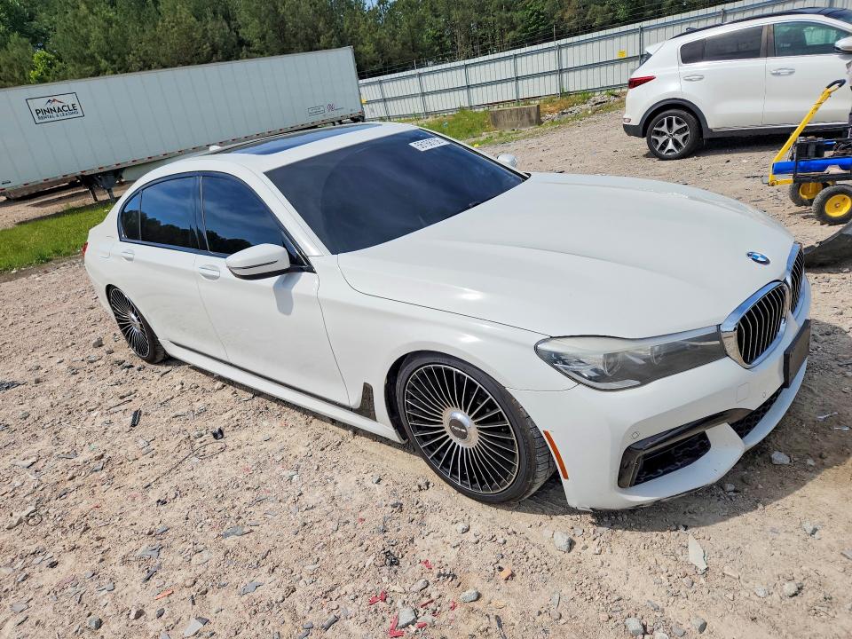 2016 BMW 7er VIN WBA7E2C59GG548029 COPART salvage auction — NORMAL WEAR, Va - Certificate Of Title, sold $6,800 on 2026-08-31 (photo 4)