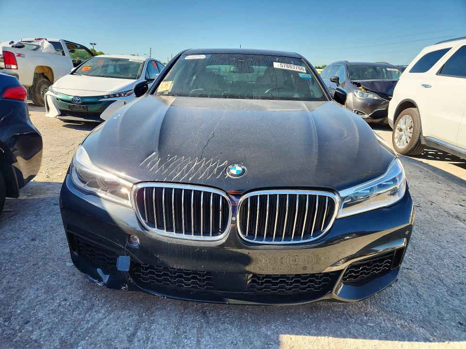 2018 BMW 7 series VIN WBA7F0C54JGM22962 COPART salvage auction — MINOR DENT/SCRATCHES, Wv - Certificate Of Title, sold $9,100 on 2026-07-27 (photo 5)